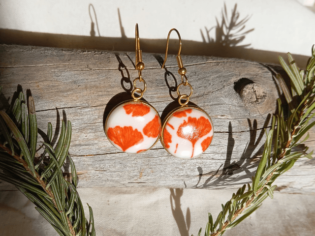 Boucles d'oreille fimo+résine rouges et blanches