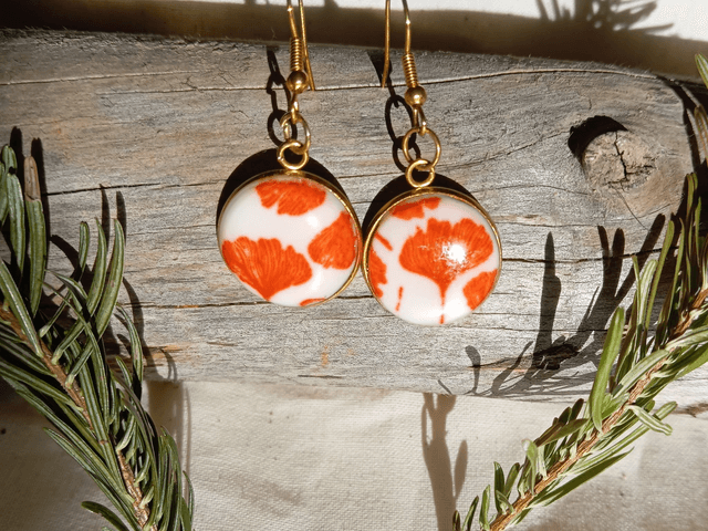 Boucles d'oreille fimo+résine rouges et blanches
